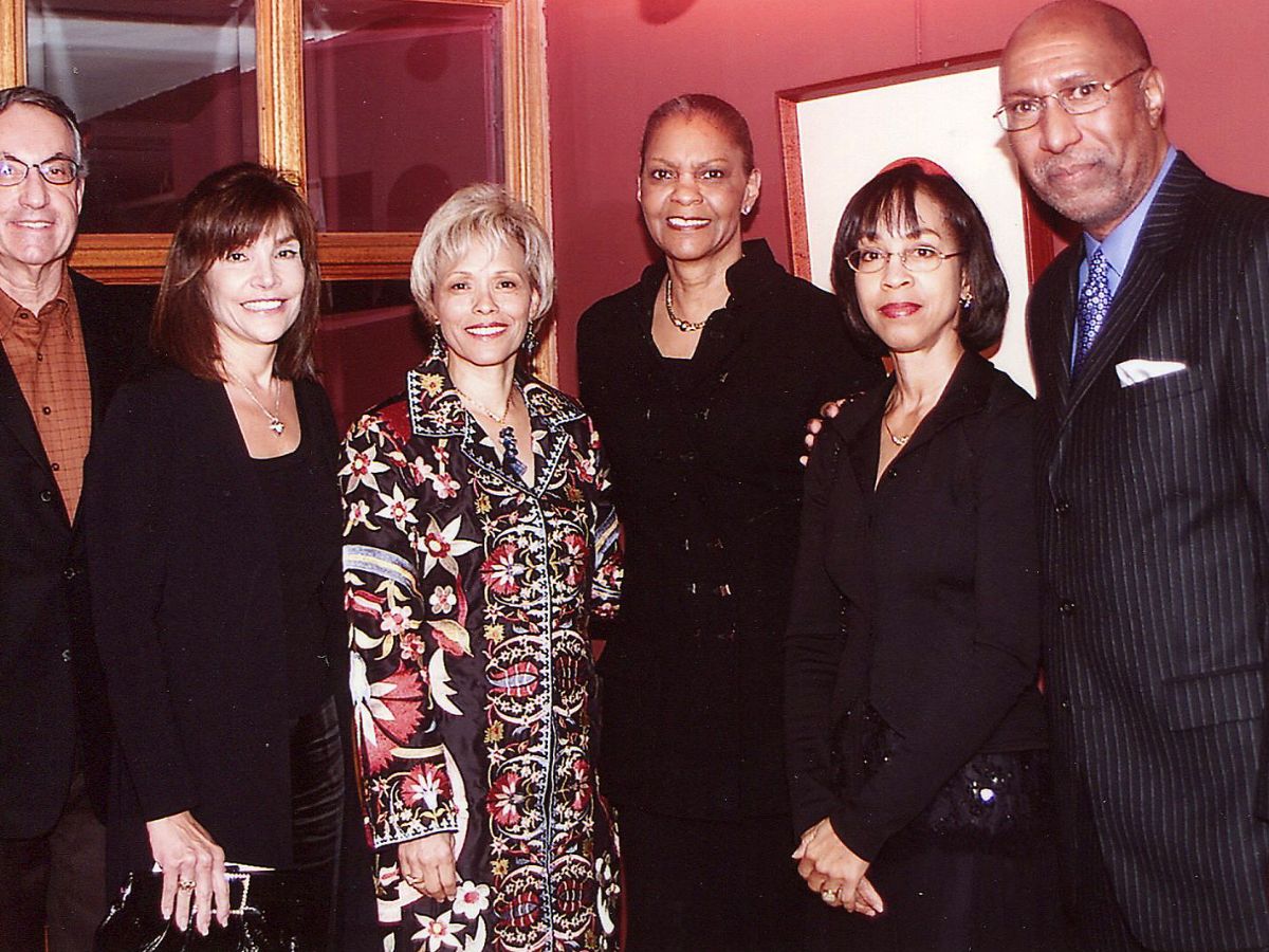 A group of people standing next to each other.
