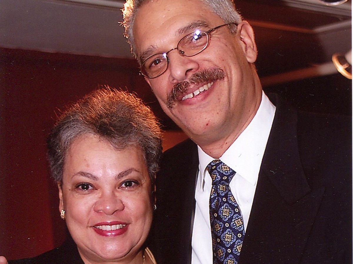 A man and woman standing next to each other.