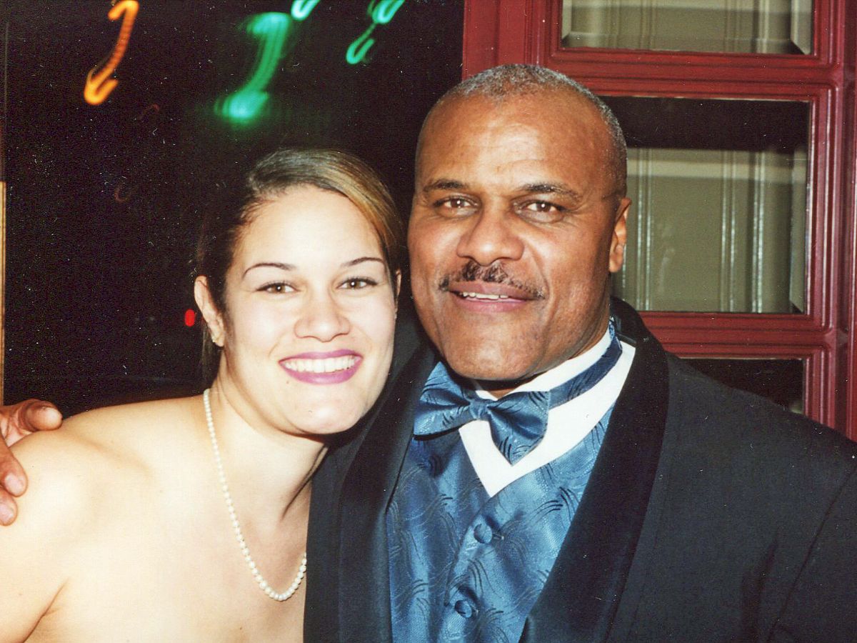 A man and woman posing for a picture.