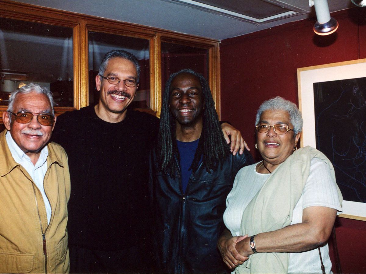 A group of people standing next to each other.