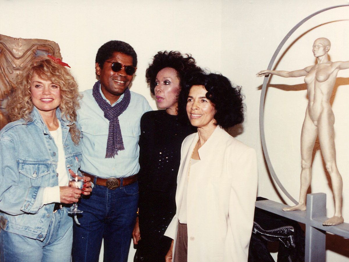 A group of people standing next to each other.